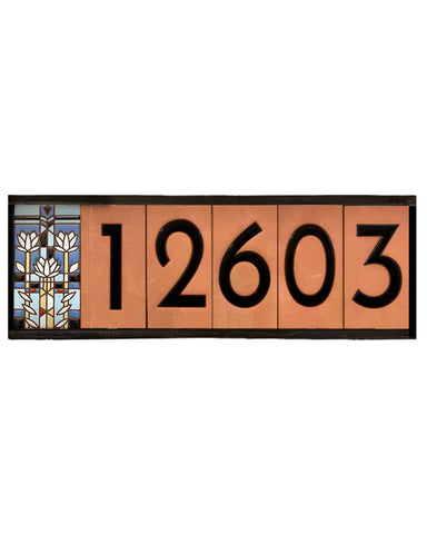 Decorative house number sign with '12603' on a white background
